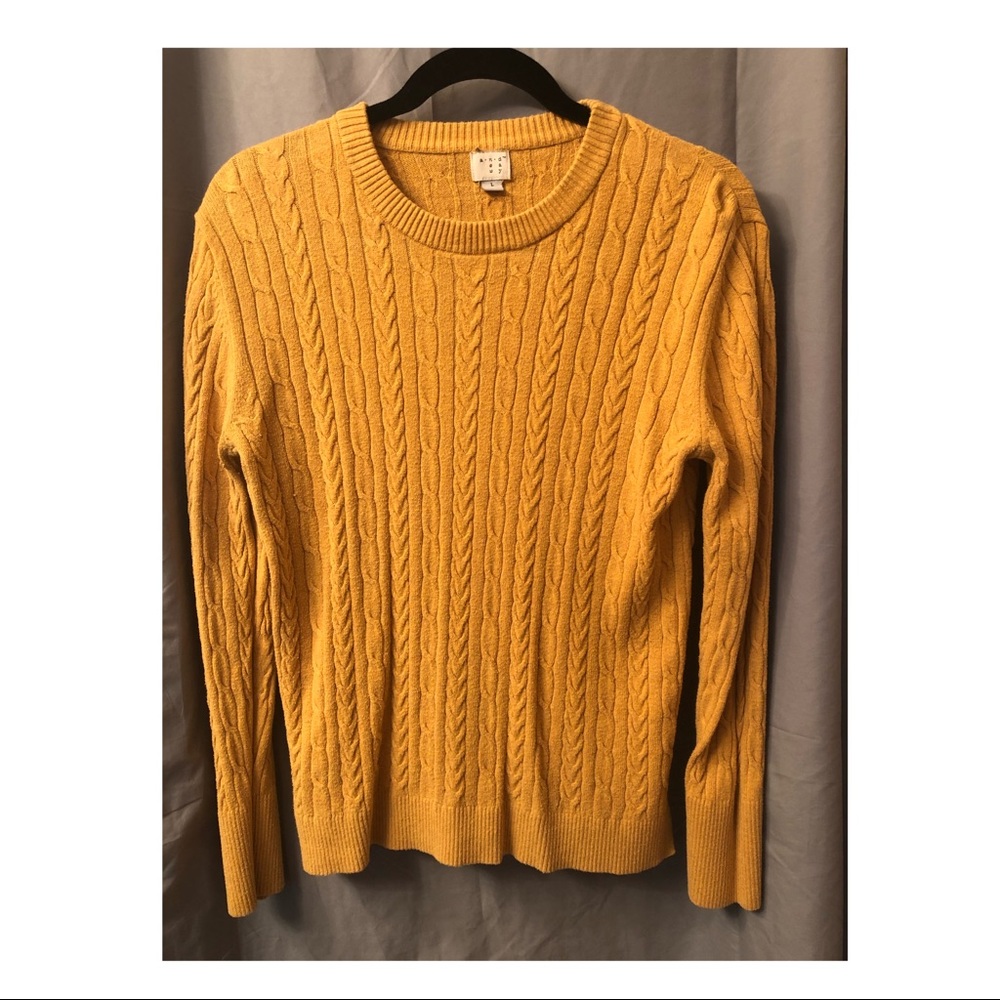 Yellow sweater with cable design